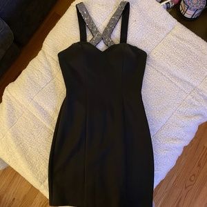Black, open back mini dress